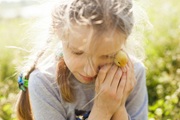 photo of sara holding flower